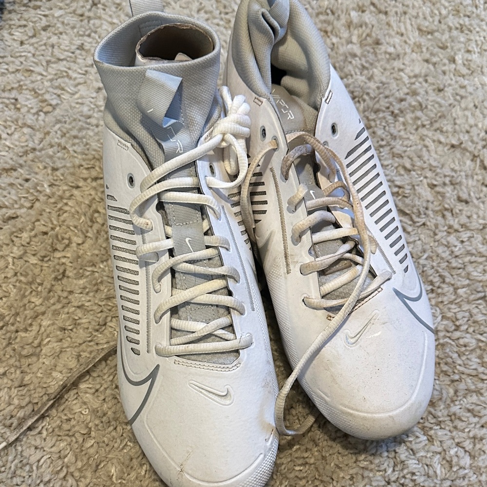 Nike White and Light Gray Athletic Cleats with Swoosh Accents